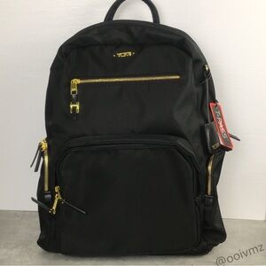 Tumi Black Backpack with Gold Zippers